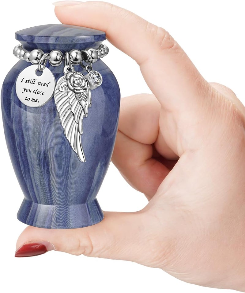 XIUDA Memorials Small Urns for Human Ashes Keepsake Aluminum Mini Urns for Ashes with Angel Wing Charm Decorative Burial Urn Funeral Cremation Urns for Women and Men (Dusty Blue) - Image 1